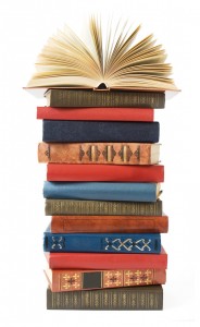 Antique book stack isolated on white background