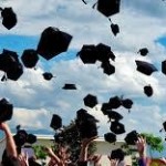 Graduation hats in air